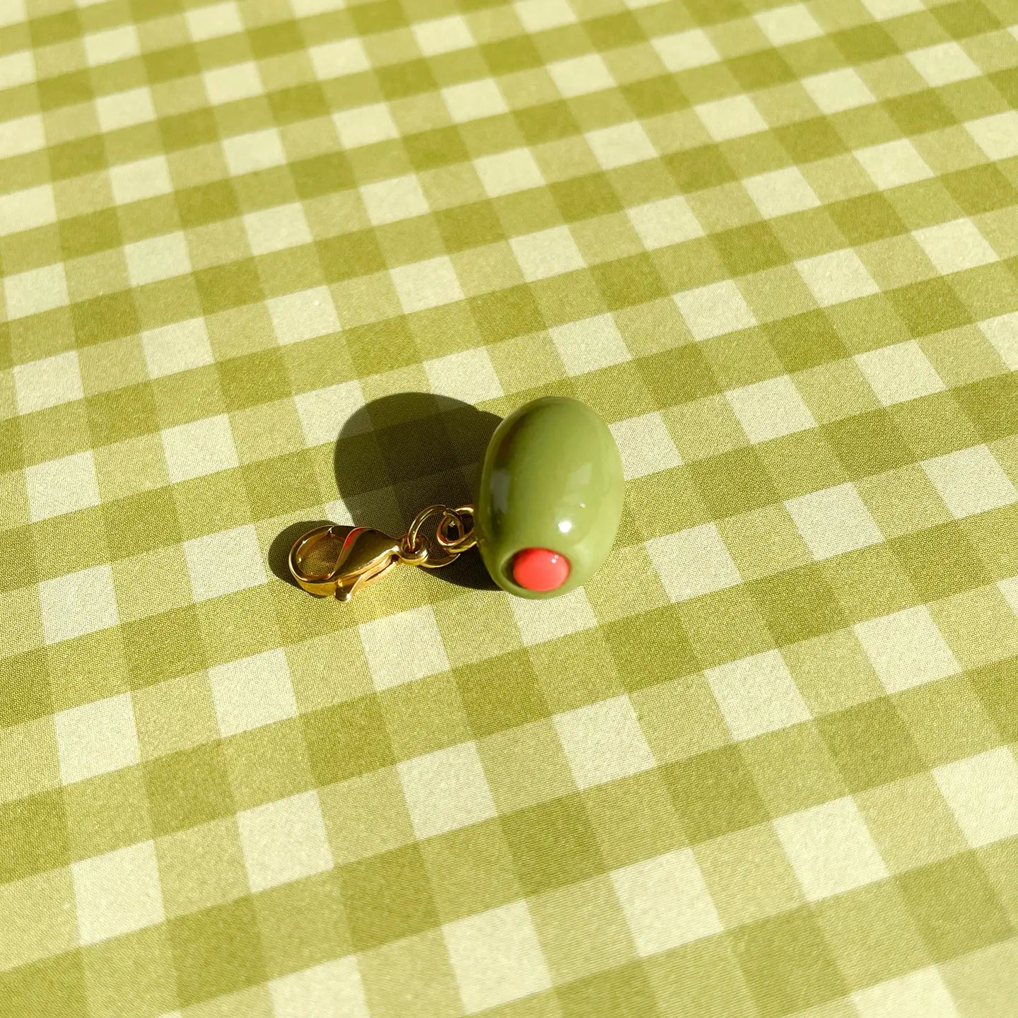 Olive hand painted charm